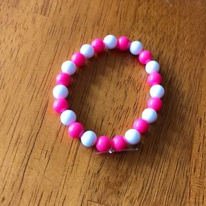 a cute pink and white bracelet